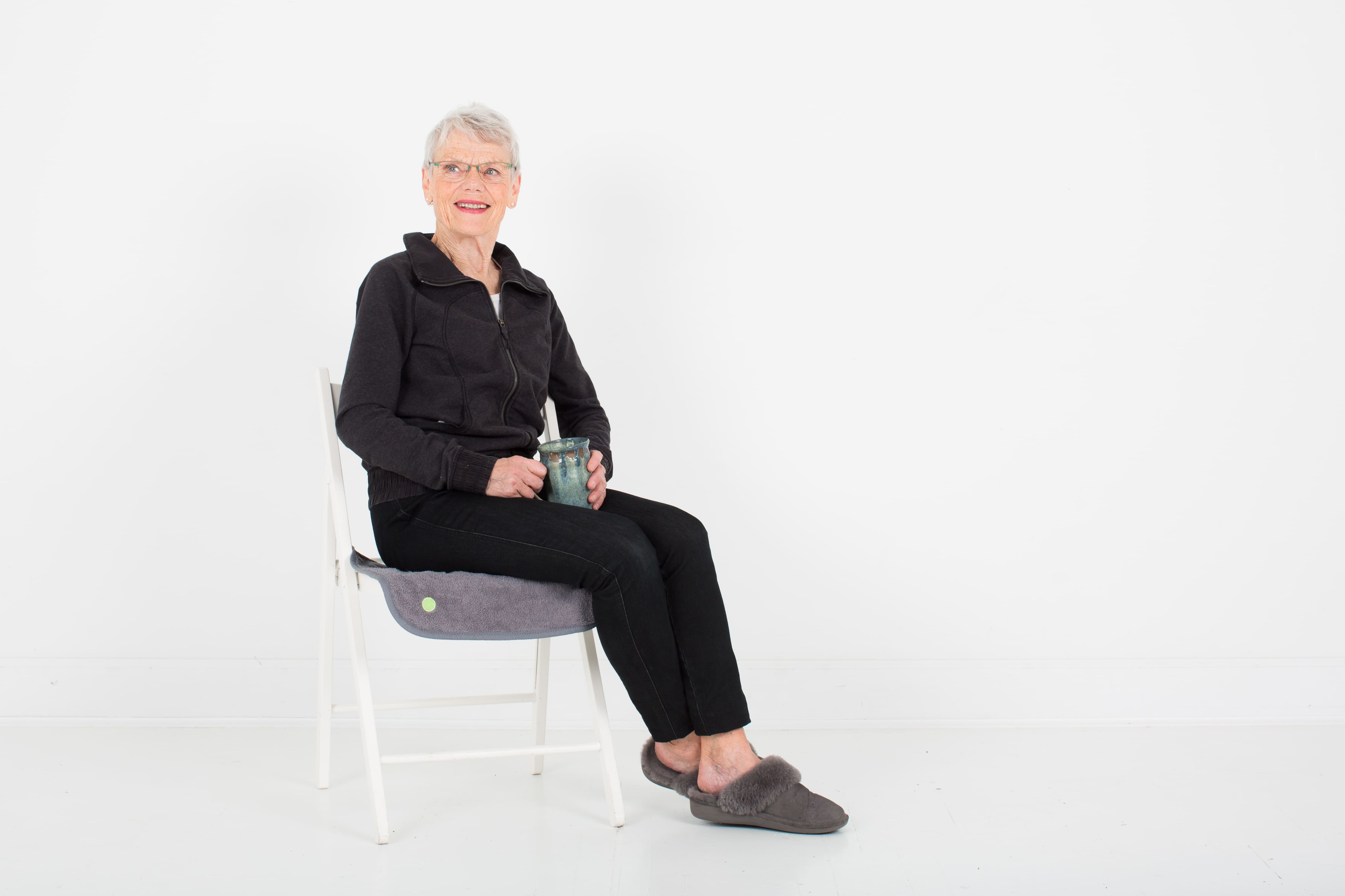 PeapodMats | Waterproof Mat | Grey | Eldery women on a Chair with Mat | SavvyMama 