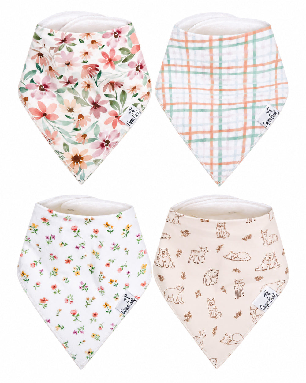 Flat lay of Copper Pearl Natalie baby bandana bibs showing all four designs