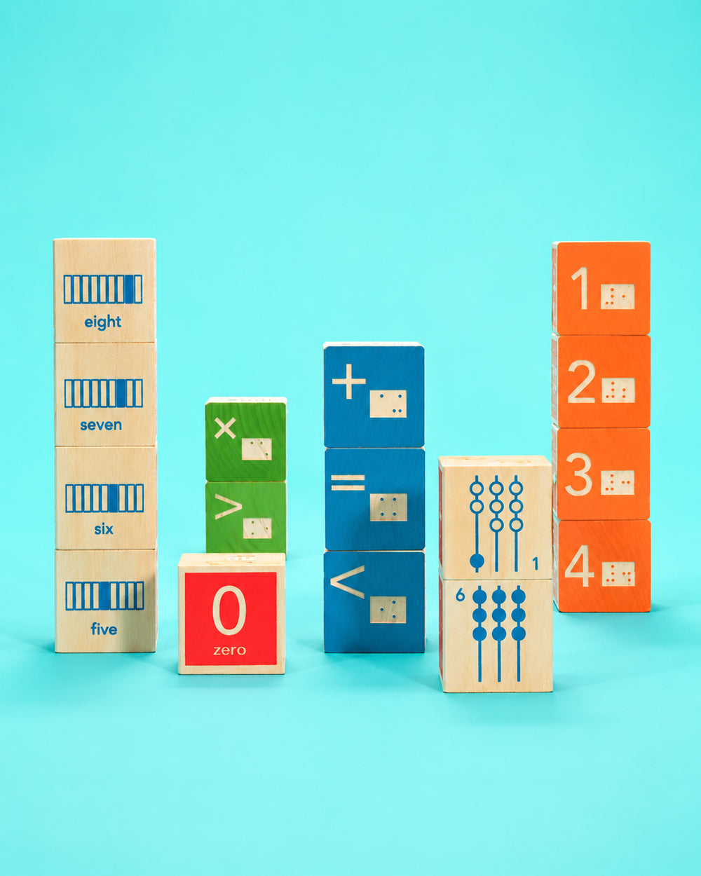 Uncle Goose Braille Math wooden blocks with numbers, maths symbols and abacus illustrations on a turquoise background