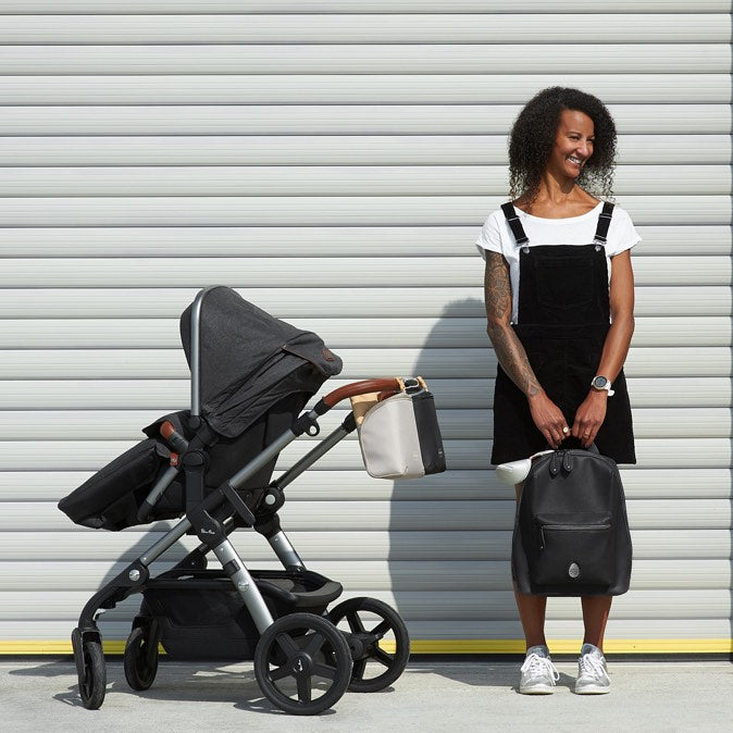 Pacapod Hartland Pack | Diaper Backpack |Lady Holding Diaper Backpack  | Black | SavvyMamaSG